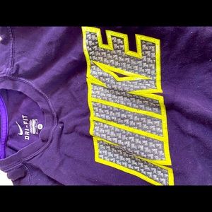 Purple and yellow NIKE short sleeve t-shirt. Size Medium.